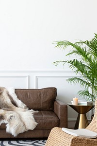 Cozy modern industrial style room with animal fur throw and rattan armchair