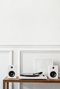 White minimal vinyl record player with speakers