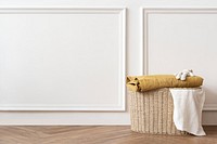 Rattan laundry basket in a white room