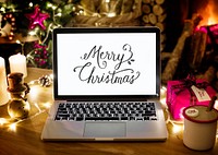 Laptop showing Merry Christmas words