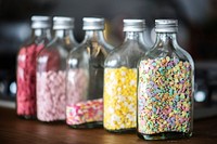 Bottles with colorful sprinkles