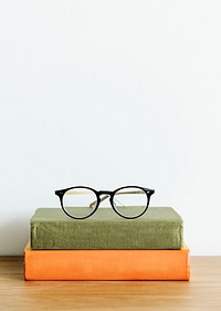 Two books and a pair of glasses