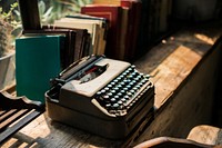 Closeup of retro typewriter on wooden table