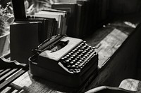 Closeup of retro typewriter on wooden table