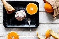 Delicious ice cream and oranges