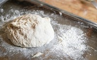 Dough on a tray with flour