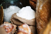 Sack and a glass jar filled with white flour
