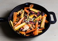 Mixed carrots and turnips in a sauce pan