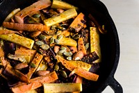 Mixed carrots and turnips in a sauce pan