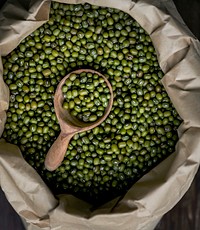Close up of mung beans in a paper bag