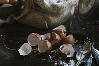 Cracked egg shells and a scale