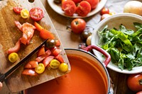 Homemade tomato soup cooking in a kitchen