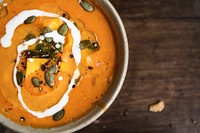 Close up of a pumpkin soup in a bowl