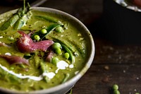 Close up of green pea soup in a bowl