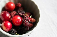 Small bowl containing various berries