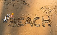 Beach written in the sand