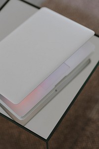 Aerial view of a laptop on a white table