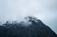 Snowy mountain on a misty day