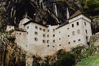 Predjama castle mountainside in Slovenia