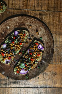 Homemade organic chickpea toast on a wooden plate