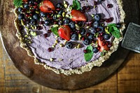 Sweet potato tart topped with strawberries and blueberries