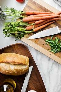 Sourdough bread and carrots on a cutting board