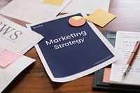 Marketing strategy report on a desk