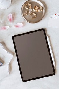 Digital tablet with blank screen flat lay