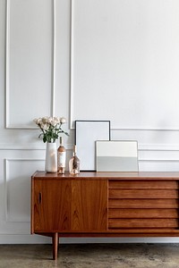 Wooden cabinet against a white wall