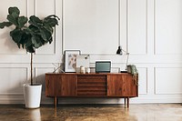 Wooden cabinet against a white wall