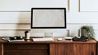 Computer screen mockup on a wooden desk