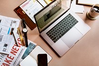 Laptop on a messy desk