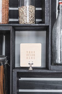 Dry grains in containers by a wooden board mockup