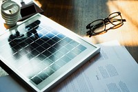 Solar panel on a wooden table