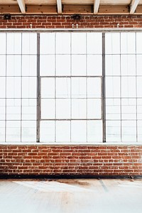 Brick wall with big glass window interior background