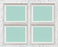 Four photo frames isolated on white wall