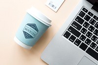 Coffee cup and laptop mockup