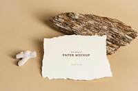 Blank white card on beige background mockup