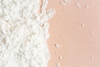White powder on pink background