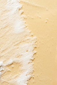 White powder on beige background