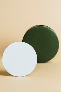 Olive green vase with a blank label mockup 