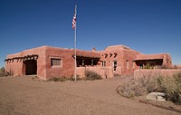The Painted Desert Inn, originally built of petrified wood and other native stone and modified to this adobe configuration in the 1930s near Holbrook in Arizona&rsquo;s remote Navajo County.