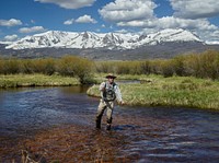 Owner John Kukral wets a line at his Park Range Ranch, near the Wyoming border in Jackson County&#39;s scenic North Park valley of the Rocky Mountains. Original image from <a href="https://www.rawpixel.com/search/carol%20m.%20highsmith?sort=curated&amp;page=1">Carol M. Highsmith</a>&rsquo;s America, Library of Congress collection. Digitally enhanced by rawpixel.