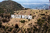 The Hollywood Sign (formerly the &quot;Hollywoodland&quot; sign) is a landmark and American cultural icon located in Los Angeles, California.