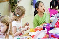 Girls having lunch at canteen.