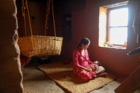 A Nepalese Mother and Her Infant. Original image sourced from US Government department: Public Health Image Library, Centers for Disease Control and Prevention. Under US law this image is copyright free, please credit the government department whenever you can”.