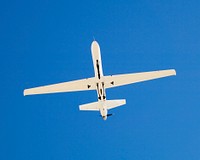 The narrow fuselage of NASA&#39;S Ikhana unmanned science aircraft is evident in this view from underneath. Mar 5, 2007. Original from NASA. Digitally enhanced by rawpixel.