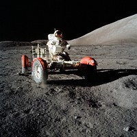 Astronaut Eugene A. Cernan, commander, drives the Lunar Roving Vehicle during first Apollo 17 extravehicular activity at the Taurus-Littrow landing site. Original from NASA. Digitally enhanced by rawpixel.