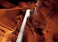 Light pours through an opening in an Arizona &quot;slot canyon&quot; near Page. Original image from <a href="https://www.rawpixel.com/search/carol%20m.%20highsmith?sort=curated&amp;page=1">Carol M. Highsmith</a>&rsquo;s America, Library of Congress collection. Digitally enhanced by rawpixel.