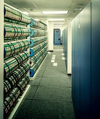 Computer data storage in a modern office building in the 80s. Original image from Carol M. Highsmith&rsquo;s America, Library of Congress collection. Digitally enhanced by rawpixel.